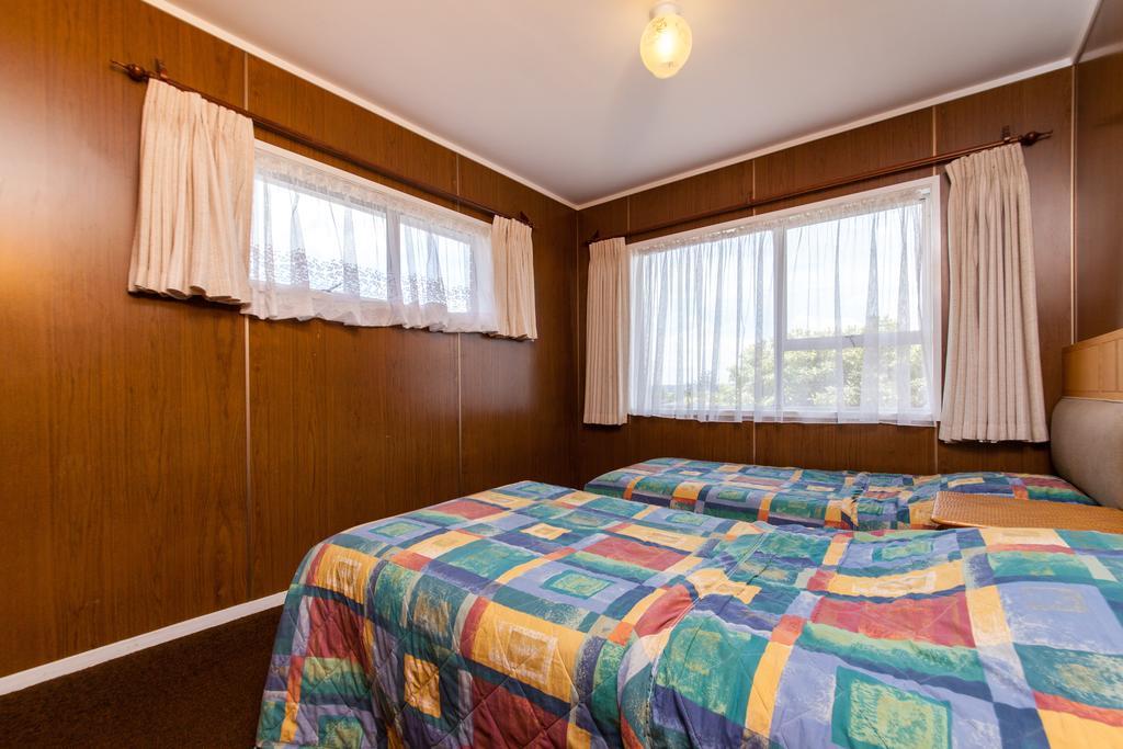 Sunset Lodge Motel Taupaki Quarto foto